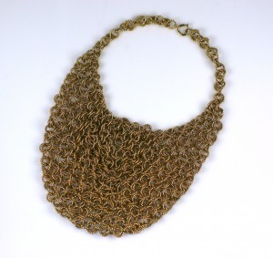 Gilt Chain Draped Bib